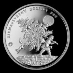 A man with a cut tree. Collectible coin issued by the Bank of Latvia