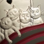 Closeup of Five cats in the bed, collectible coins