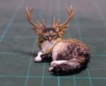 Horned cat sculpture
